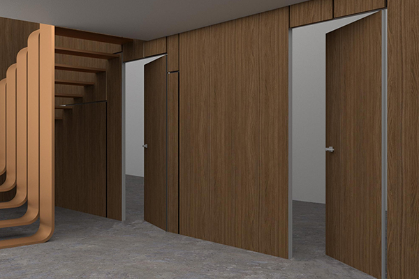Premium frameless and concealed frame solid wood doors in a modern commercial interior, featuring flush wood panels with seamless design — Canada Wood Doors